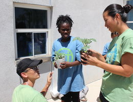 Angie Lam interacting with children from underserved communities during Operation Fit in 2015