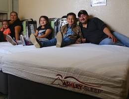 Six LLUCH patient families get bedroom donation from Ashley Furniture