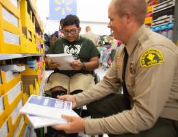 ‘Shop with a Cop’ pairs LLU Children’s Hospital patients with law enforcement to gear up for school year