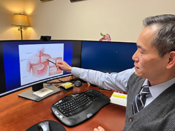 Dr. Yang showing diagram of esophageal cancer