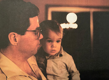 Young Michael O'Leary with his father