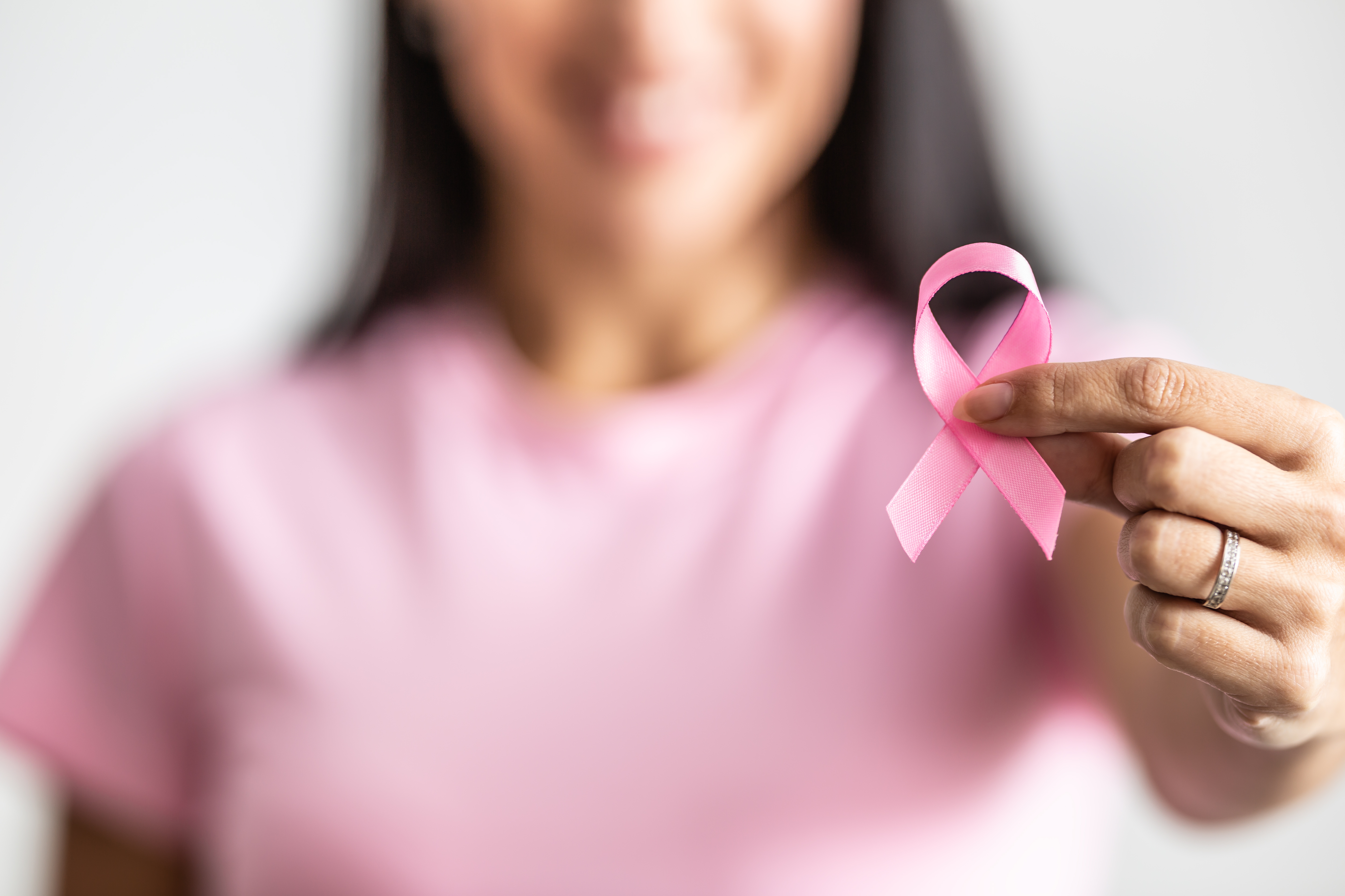 Woman with breast cancer ribbon