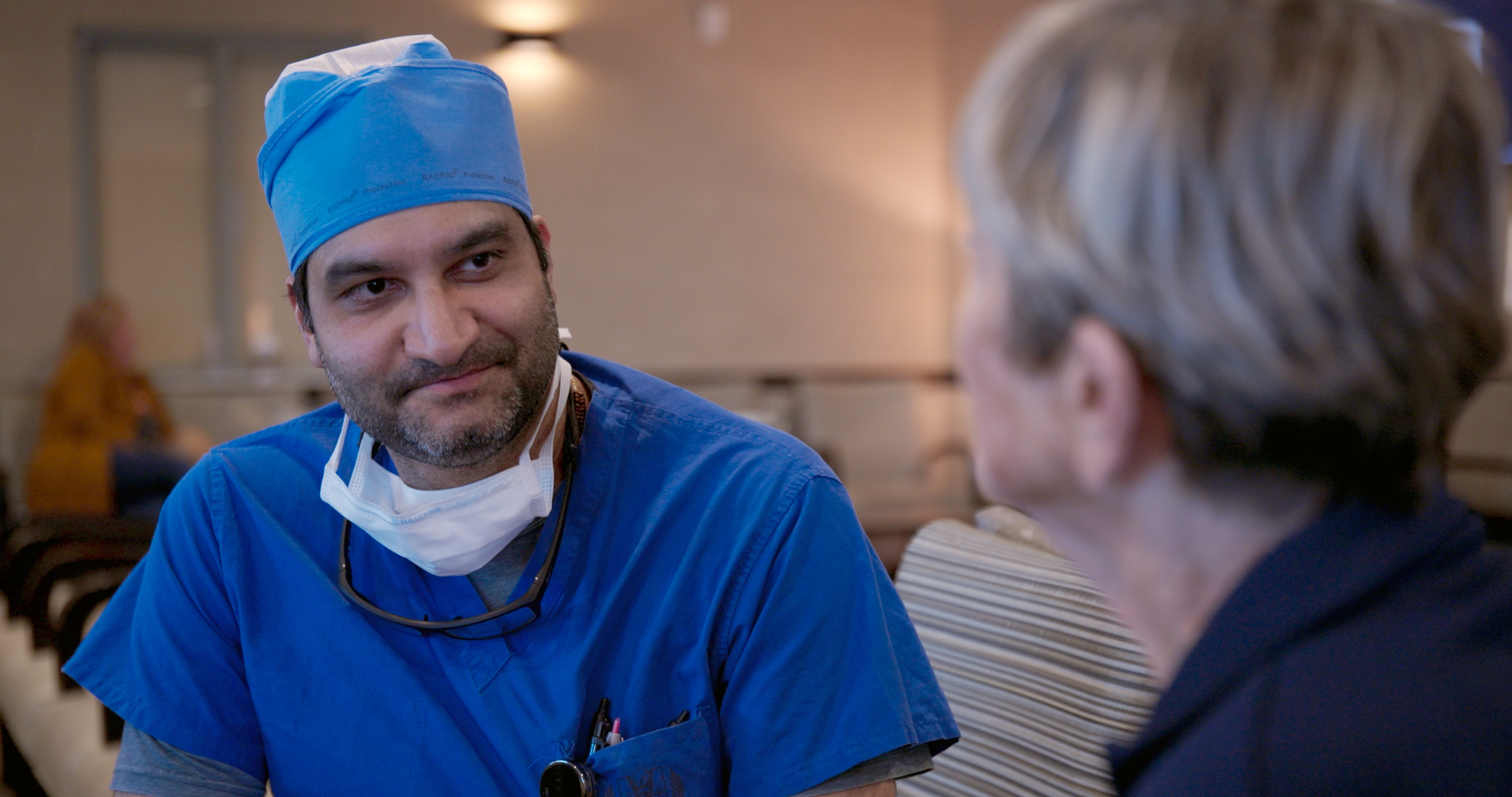 Doctor speaking with patient
