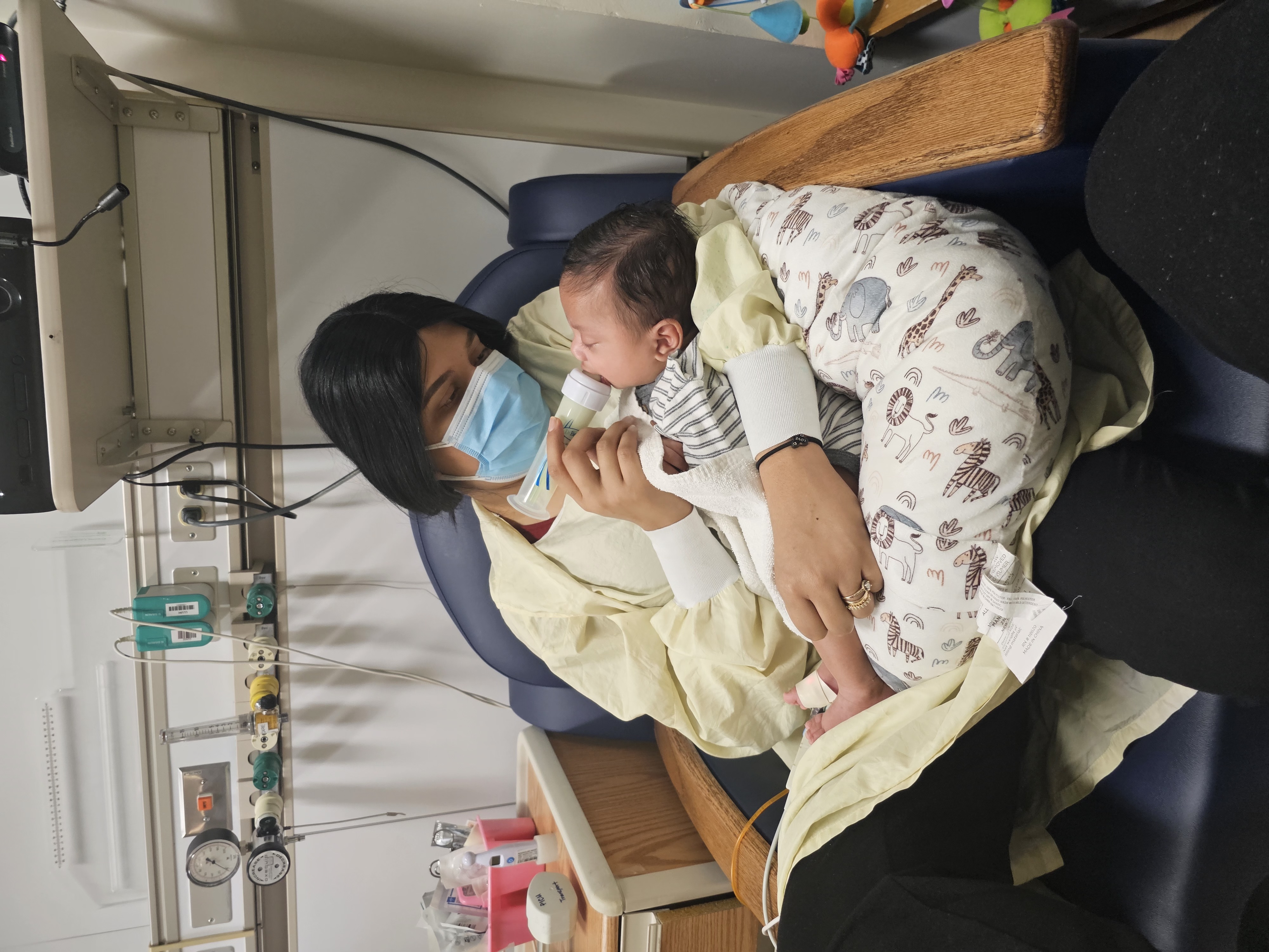 Ariatna and her son in the hospital