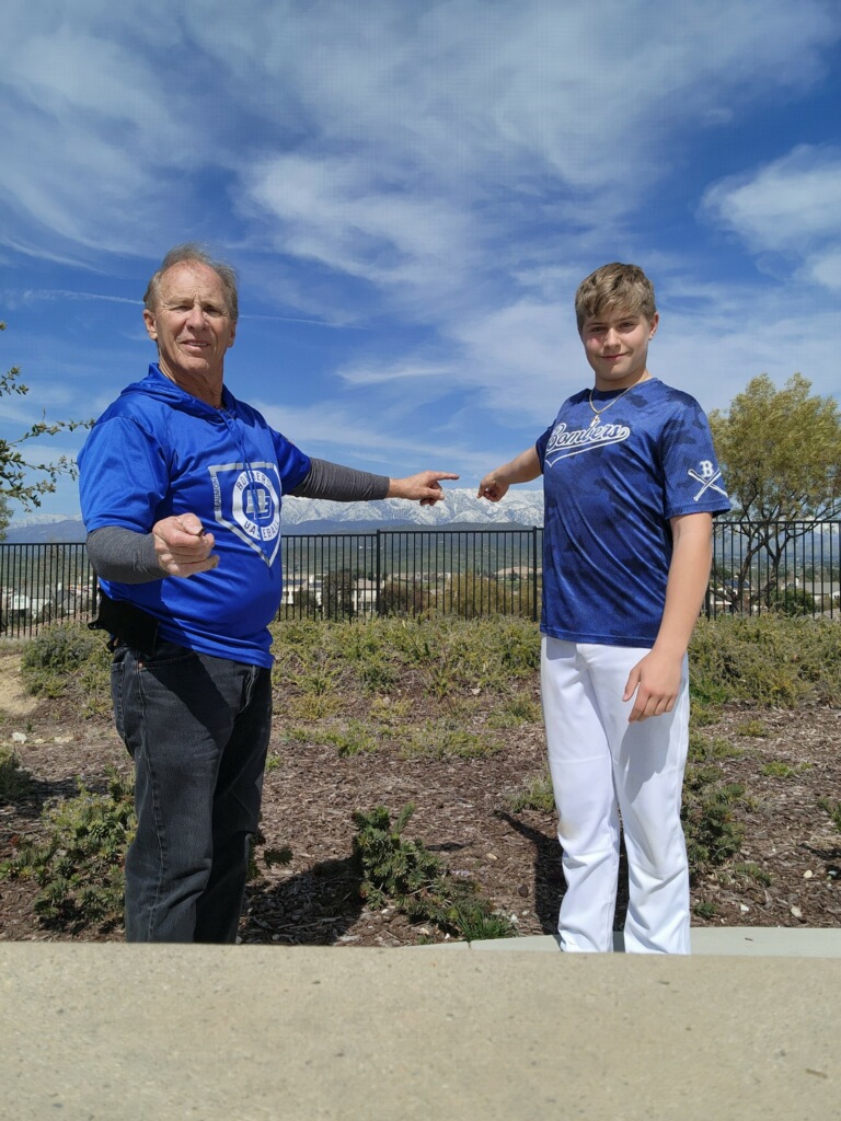 Caucasian man and his grandson outdoors