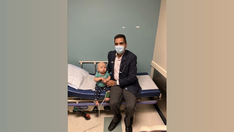 Hisham Abdel-Azim, MD, MS, chief of the division of transplant and cellular therapy (TCT) at Loma Linda University Cancer Center, meets with a young patient. Abdel-Azim is last author of a recently published study demonstrating new technology’s ability to enhance success and accessibility of blood and marrow stem cell transplants for children with blood cancers. Dr. Hisham Abdel-Azim and young patient