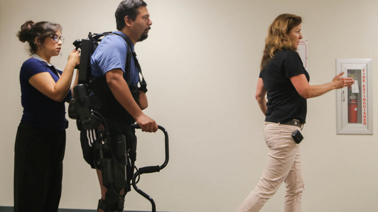 Male learning to walk with the Ekso