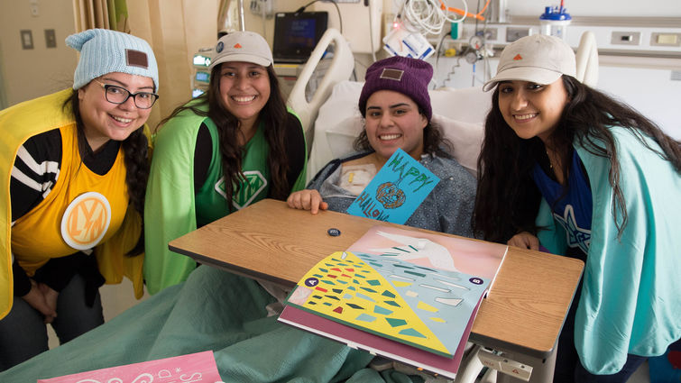 Women in hospital smiling for photo