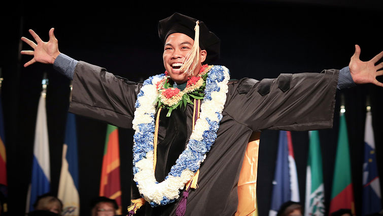 A graduate reflects the joyous mood of graduation day 2018 at Loma Linda University