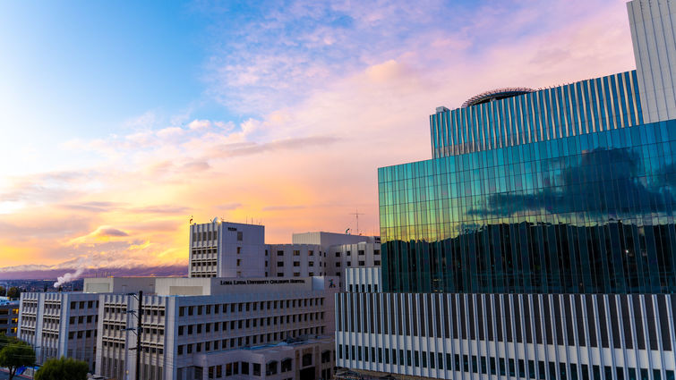 view of children's hospital with sun setting