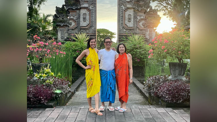 Vy Phan with her parents in Asia