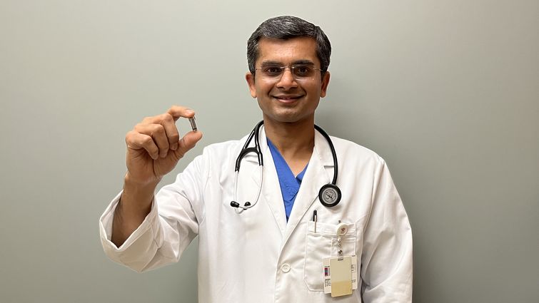 Dr. Harit Desai, associate director for the cardiac catheterization lab and structural heart intervention program at LLUMC – Murrieta, holds the world's smallest pacemaker.