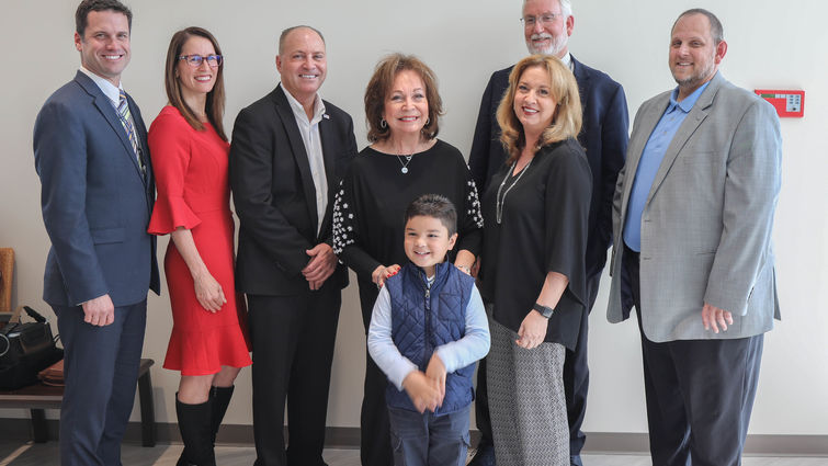 hospital administrators, city representatives, a the auen foundation cut ribbon