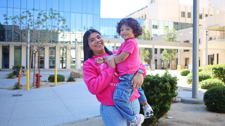 Ariatna and her son outside LLUMC