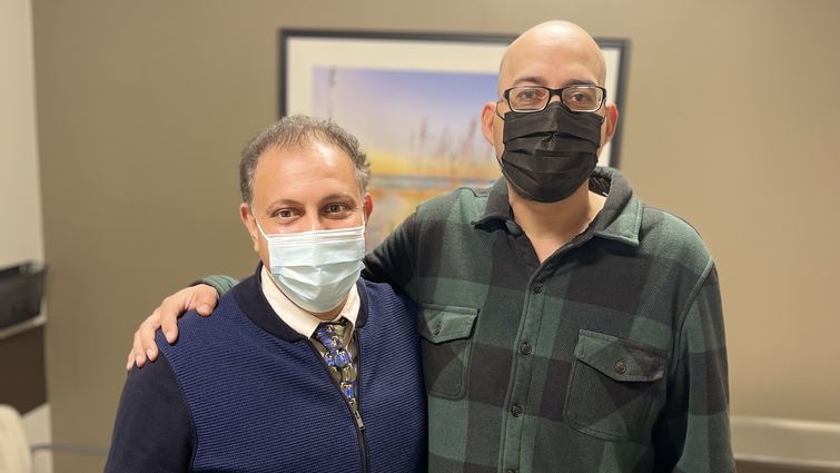 Dr. Dastjerdi (left) lead epilepsy patient Aaron Alejos (right) to live a seizure-free life. Aaron Alejos takes a photo with Dr. Dastjerdi