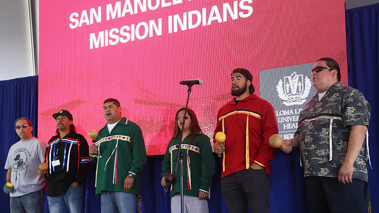 Bird singers from the San Manuel Band of Mission Indians and the Cahuilla tribe at the ribbon cutting ceremony. From left: Santos Chacon, George Murillo, Tom Ramos, Hawk Ramos, Trevor Mathews, and Will Madrigal Jr. Madrigal is from the Cahuilla tribe.