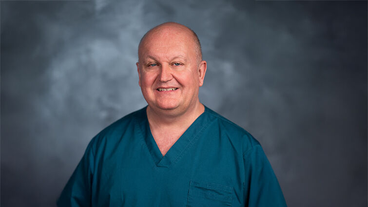 Lance Brown headshot in scrubs