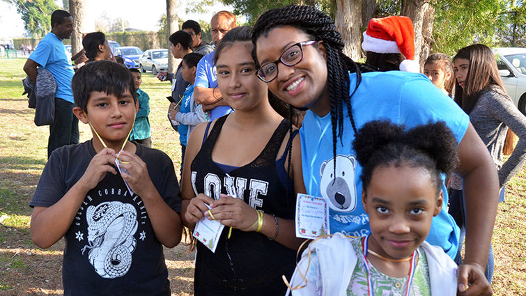 There were plenty of smiles to go around as volunteers from Loma Linda University welcomed hundreds of kids from the community to the 2016 Christmas Fiesta.