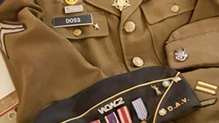 Desmond Doss’s Army service uniform with his replacement Medal of Honor are on display at the Loma Linda University Del E. Webb Memorial Library. Photograph courtesy of the department of archives and special collections, LLU, University libraries.