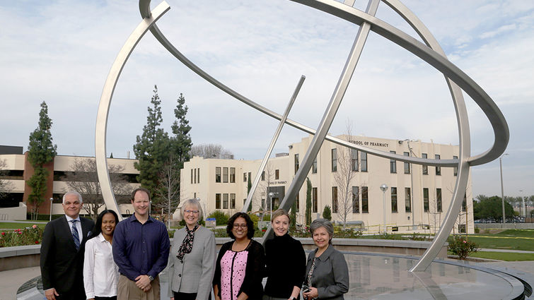 Michael Samardzija, PhD, JD, associate VP of research development (left) with GRASP Award winners Brantley, Boyle, D’Errico, Nagaraj, Montgomery and Roberts.