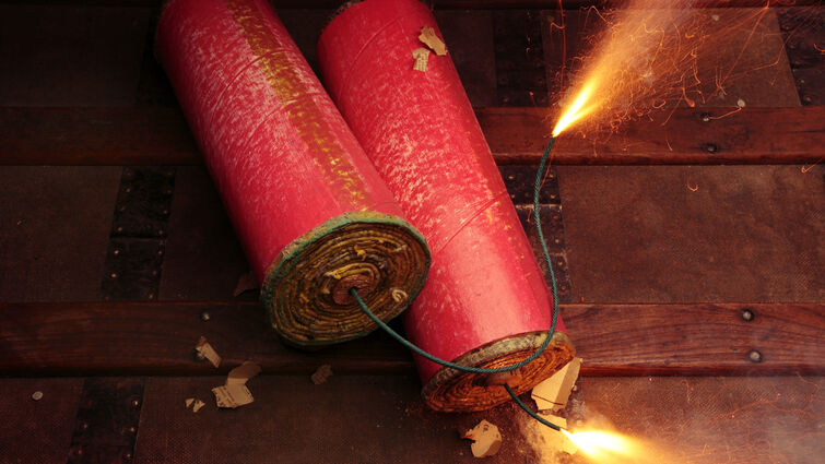 two burning firecrackers