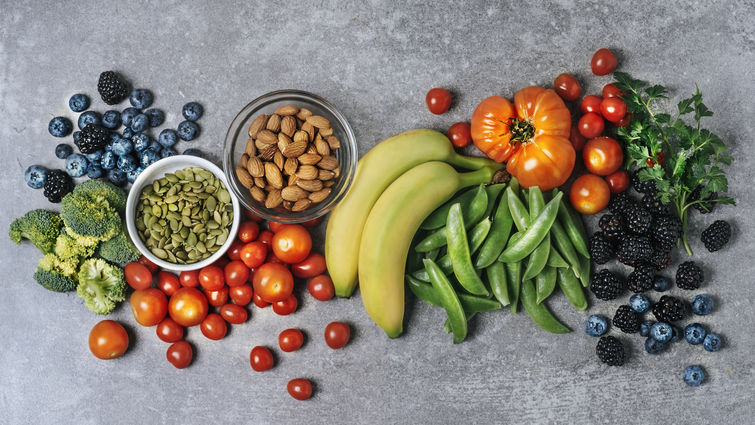 Assortment of colorful fruits, vegetables, and nuts.