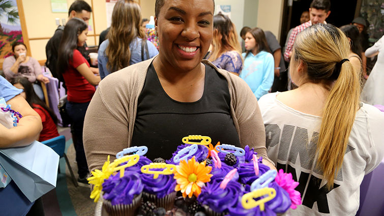 Smiles, gifts, and goodies galore at a baby shower hosted by the March of Dimes and American Medical Response.