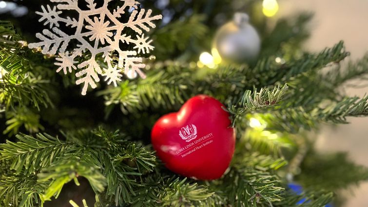 Heart with LLU International Heart Institute logo in a Christmas tree