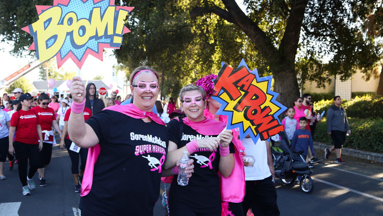 BOOM. KAPOW. These two superheroes are ready to fight cancer at the 9th annual Believe Walk. Participants in the Believe Walk