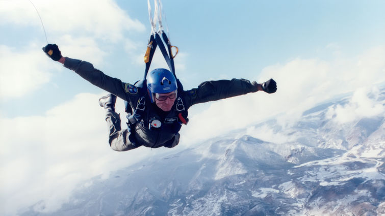 Daniel Eagle skydiving during his time as an Air Force officer.