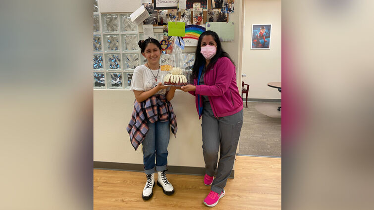 Dr. Minasian with her teen brain tumor patient