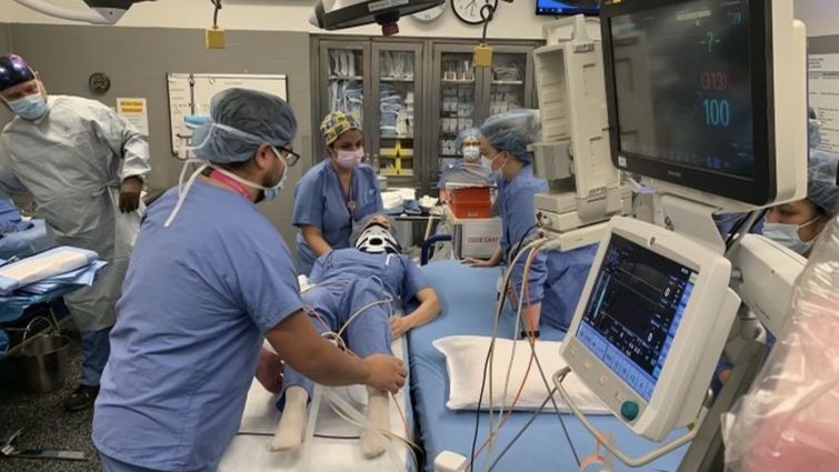 Operating room staff treat patient in mock trauma drill