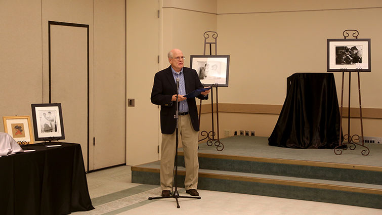 Robert Gardner, PhD, professor of sociology at Walla Walla University, discusses his father's career as a physician on the Navajo Nation during a photography and art exhibit in honor of Native American Heritage Month.