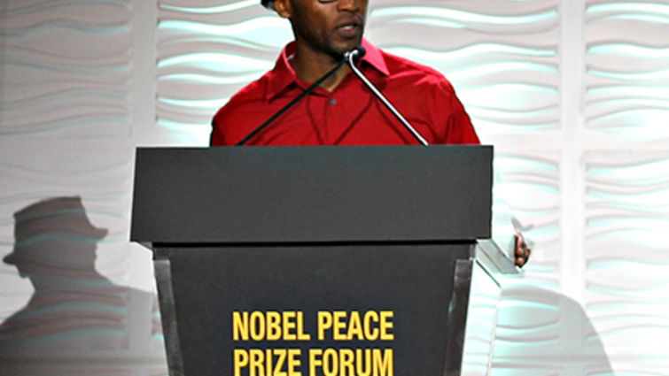 Rocky Ajoku performed and spoke at the Nobel Peace Prize Forum through connections he made as a result of the kindness of Carla Lidner Baum, DDS, MA.