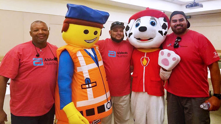 Upping the festivity factor, football players and coaches from Grand Terrace High School — some dressed as characters — volunteered for the second year in a row.
