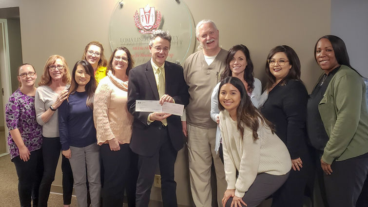 group photo of staff at the center for restorative neurlogy