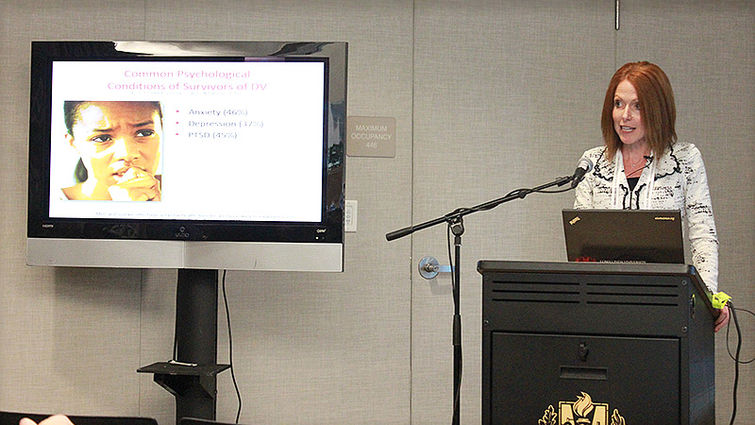 Heather Javaherian-Dysinger, School of Allied Health Professions, presents her research on the health effects felt by women who experience domestic violence.