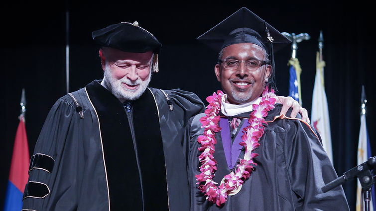 President Richard Hart and President’s Award winner Bates Moses during commencement June 10