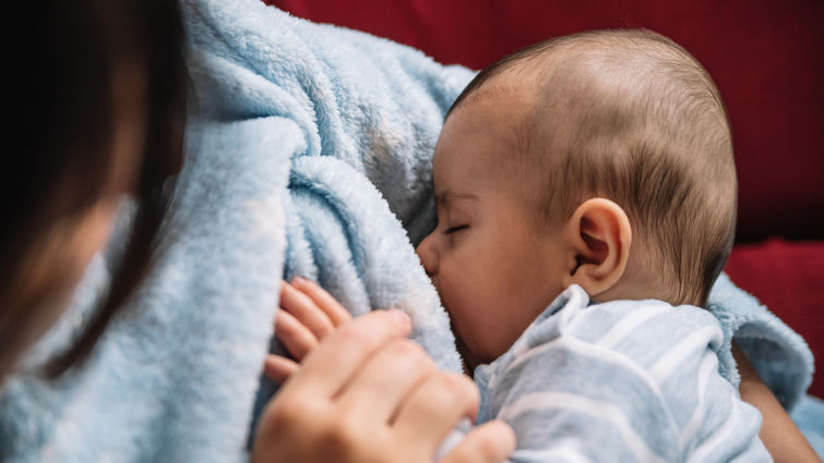 mom breastfeeding her baby