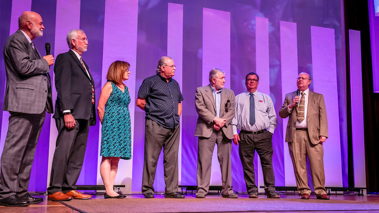 Loma Linda University Health leadership take the stage during the celebration event for the LLU Medical Center’s 50th anniversary