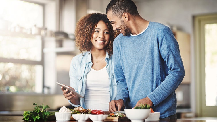 Couple in kitchen. The vegan advantage.