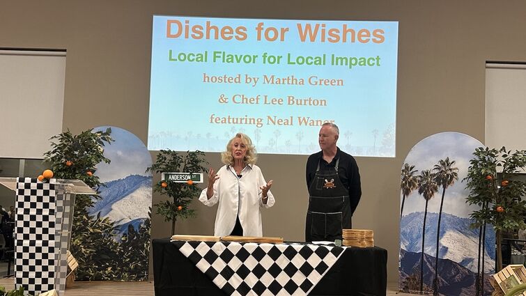 Chef Martha Green and Chef Lee Burton speak from stage