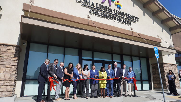 LLUH leaders and government officials cut ribbon in front of new Fontana Pediatric Urgent Care.