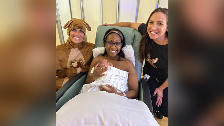 Mom in the NICU practicing kangaroo care with her baby