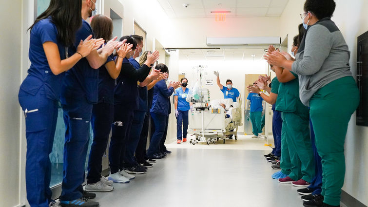 Employees cheer Employees cheer