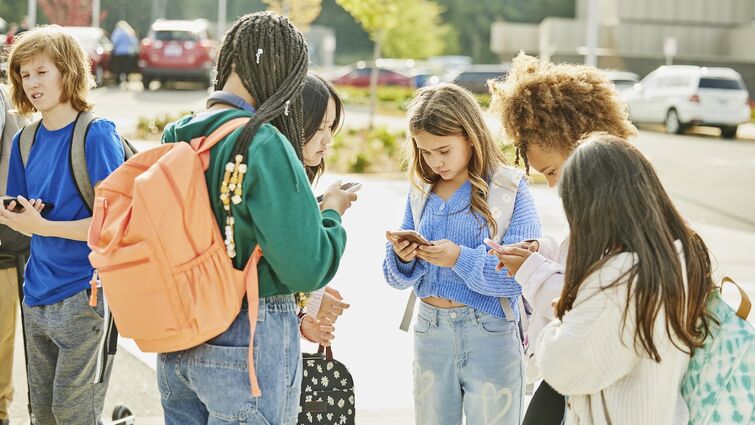 Medium wide shot middle school friends hanging out after school