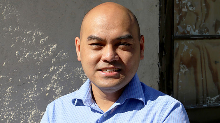 portrait of Huynh Cao, MD