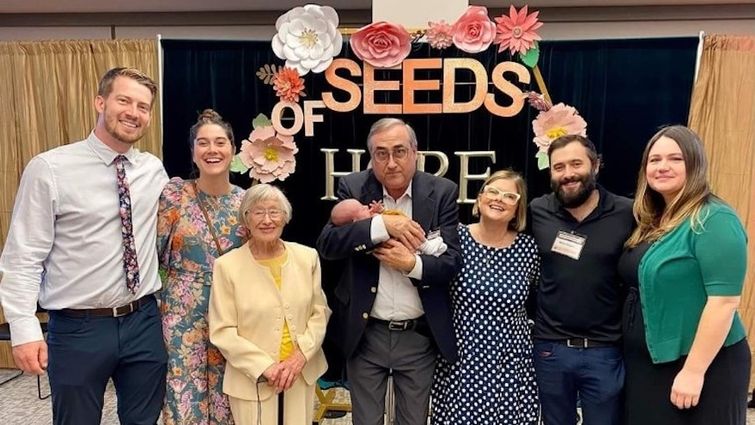 Ester Boloix-Chapman, third from right, celebrates with her family after receiving the Behavioral Health Champion Award. Ester with family at Seeds of Hope event after receiving Behavioral Health Champion Award
