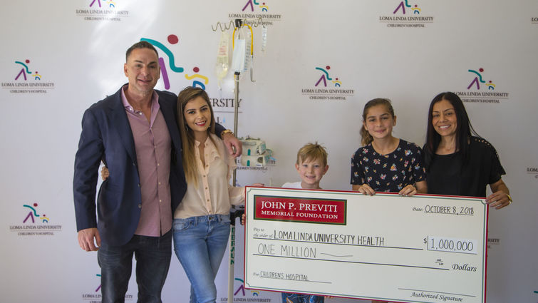 On behalf of the hospital, Loma Linda University Children’s Hospital patient Josh Olson, 10, of Temecula, accepted a check for $1 million from The John P. Previti Memorial Foundation on Monday, Oct. 8.