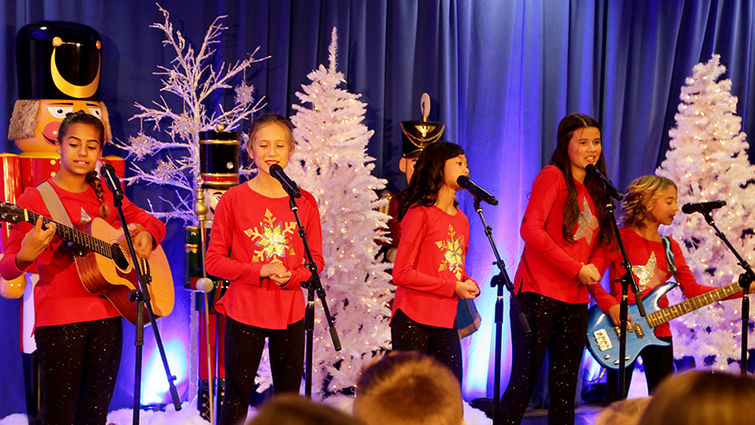 Lioness, a group of girls between the ages of 9 and 13, performed at "Carols in the Lobby" on Dec. 11. (Photos by James Ponder)